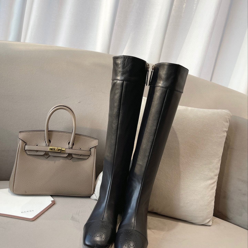 G*u*i boots